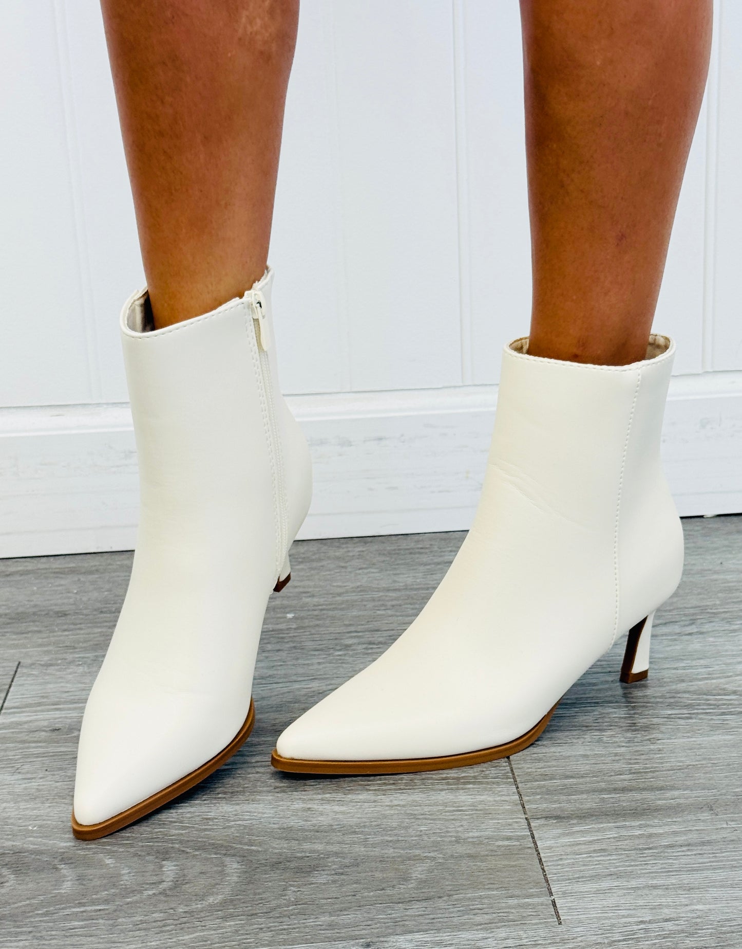 Off White Sleek Simplicity Ankle Boots