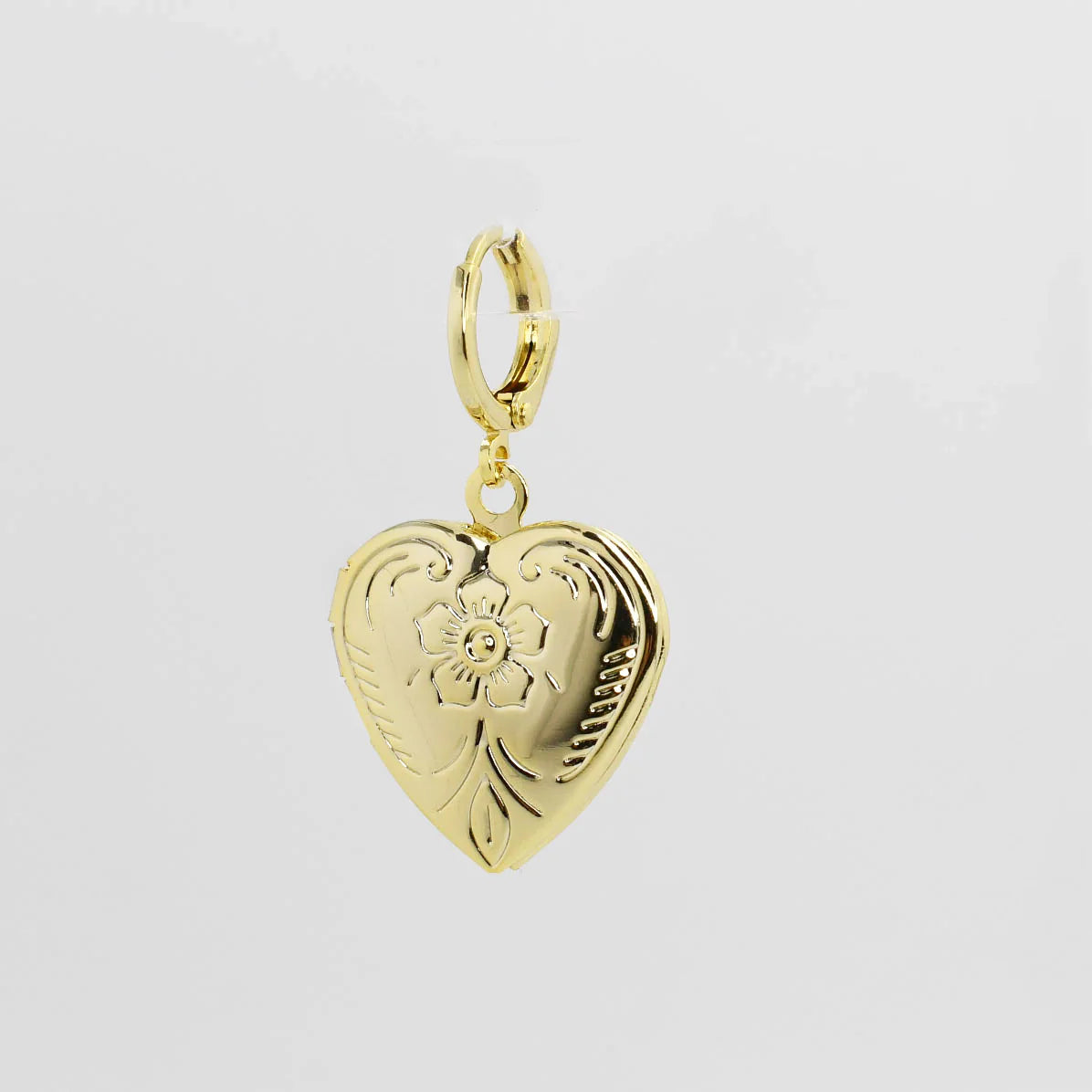 TJ - Holding Memory Heart Charm