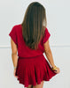Red Turtleneck Sweater & Pleated Mini Skirt Set (Reg.)